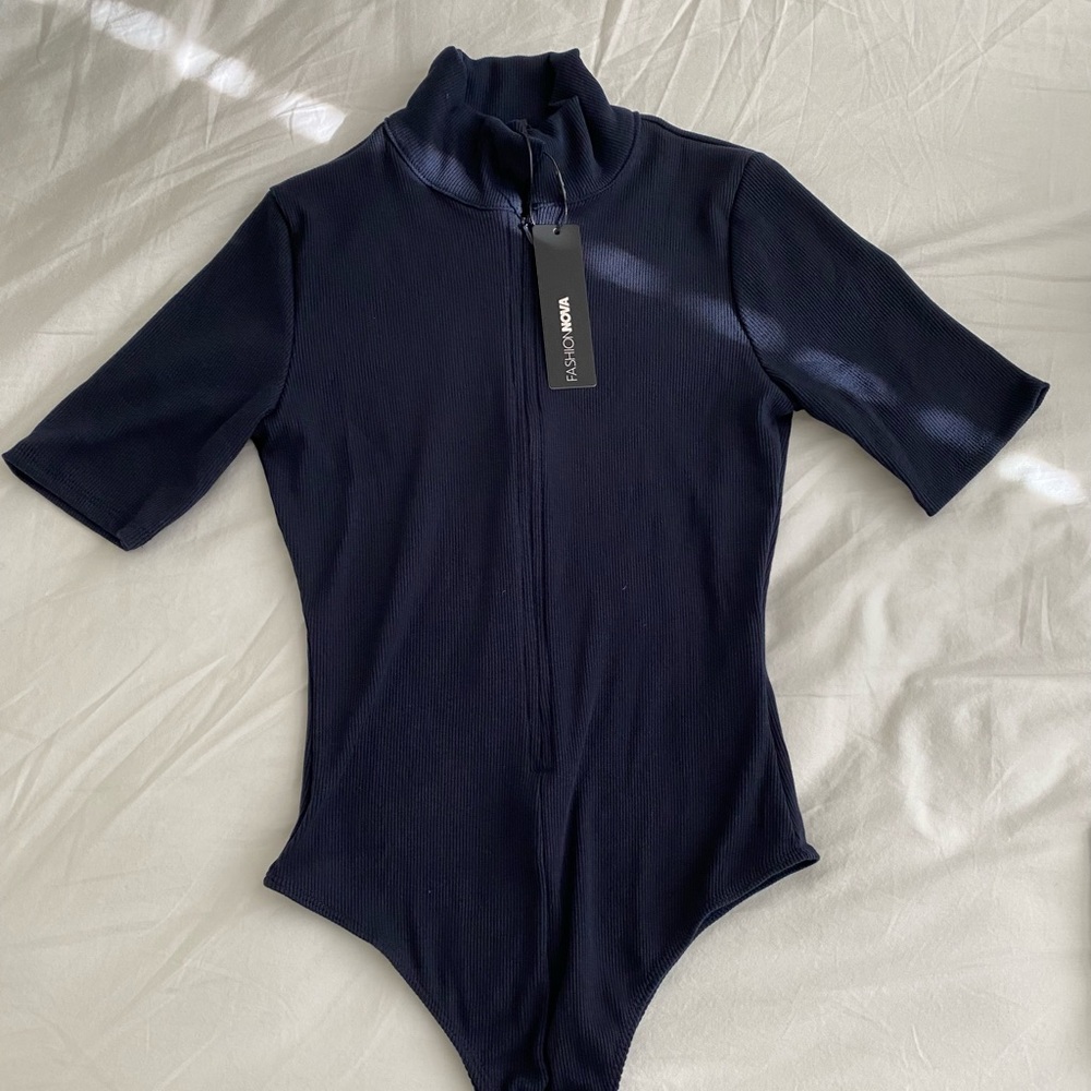 navy blue zip up body suit